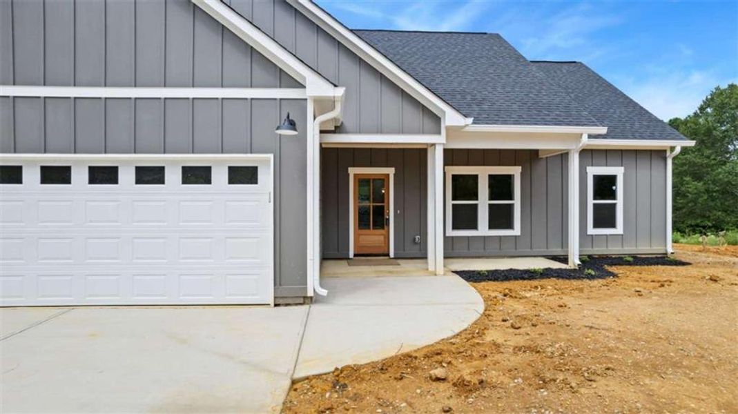 Front exterior of a new home in , Cedartown, GA, highlighting curb appeal (Image 18).