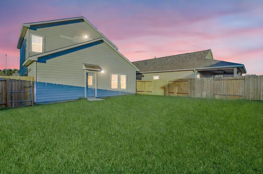 Step out to this expansive plush green lawn.