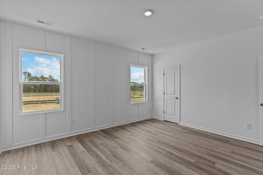 Spacious, unfurnished interior of a new home in Coastal Haven Townes, Leland (Image 27).