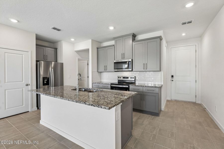 Furnished interior view inside a new home in Parkside at Shearwater, St. Augustine (Image 7).
