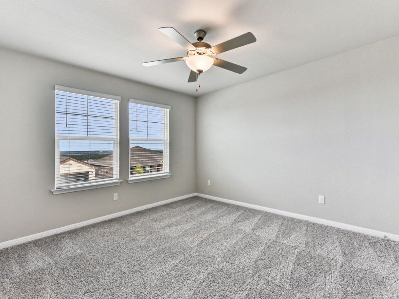 Spacious, unfurnished interior of a new home in Big Sky Ranch - Executive Collection, Dripping Springs (Image 19).