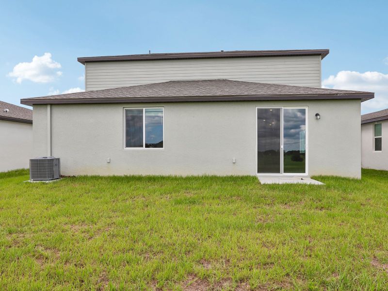 Exterior details and patio area of a home in Benton Hills - Classic Series, Brooksville (Image 3).