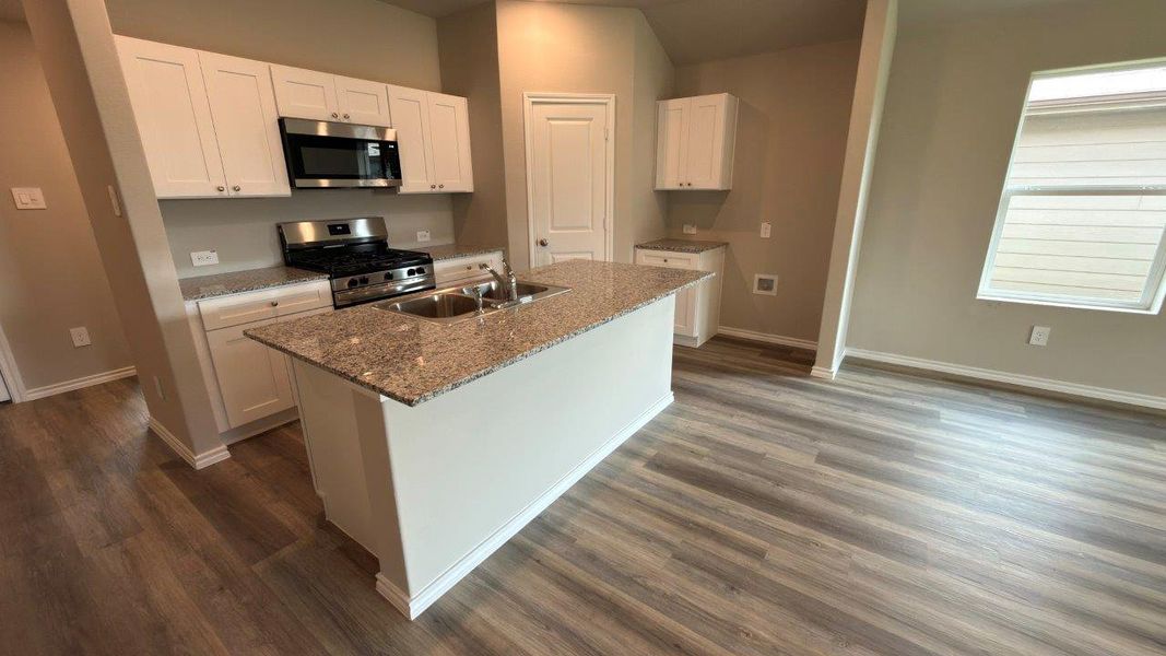 Furnished interior view inside a new home in Lonestar at Liberty Trails, Fort Worth (Image 5). Furnished interior view inside a new home in Lonestar at Liberty Trails, Fort Worth (Image 5).