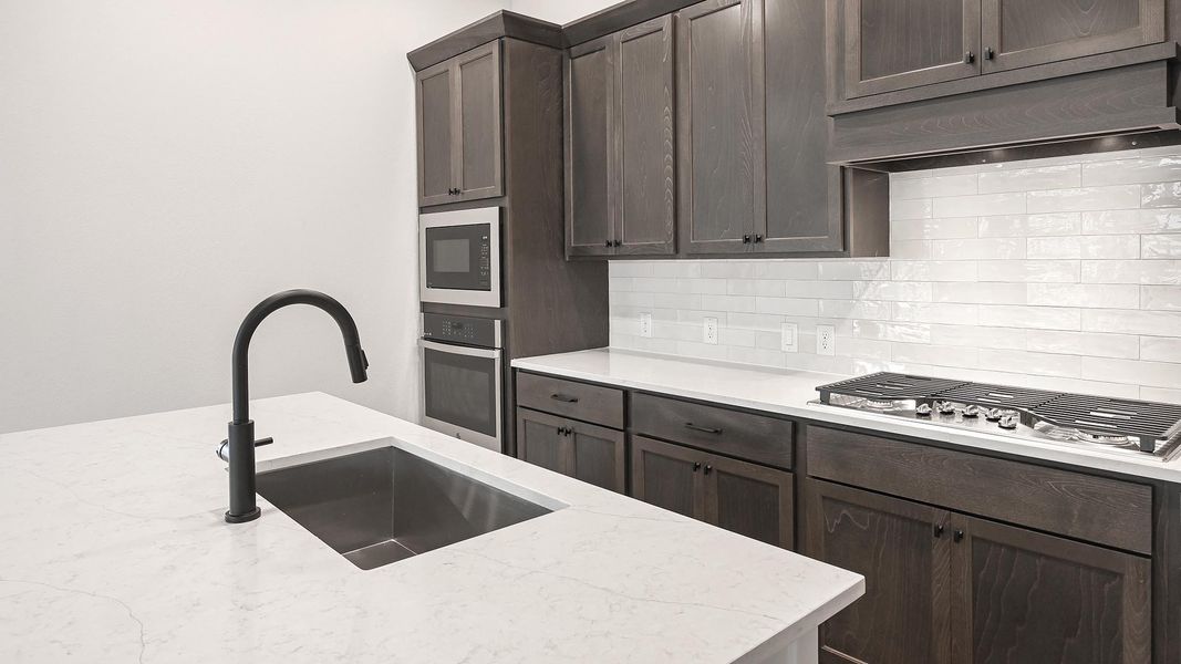 Furnished interior view inside a new home in 6 Creeks, Kyle (Image 8).