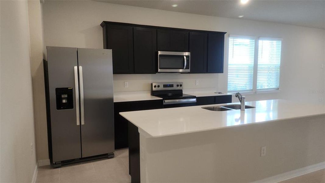 Furnished interior view inside a new home in , Winter Garden (Image 8).