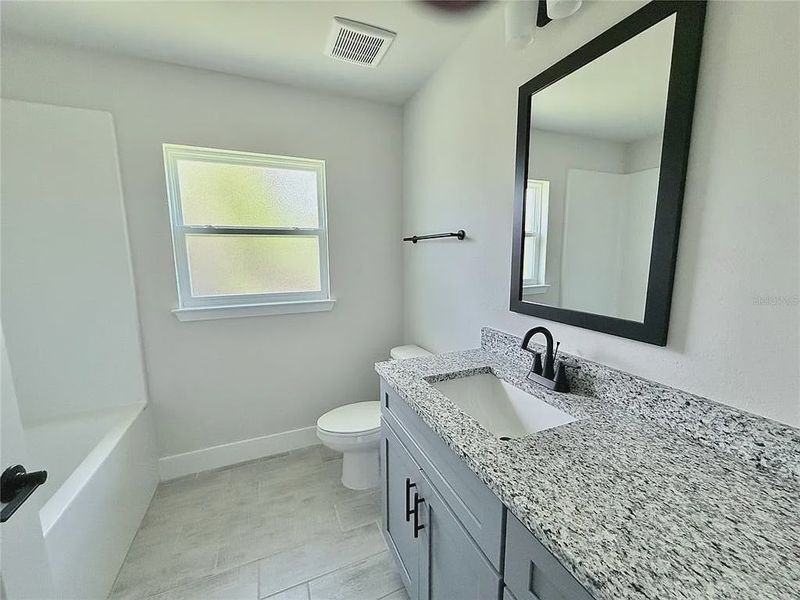 Furnished interior view inside a new home in Rotonda, Port Charlotte (Image 9).