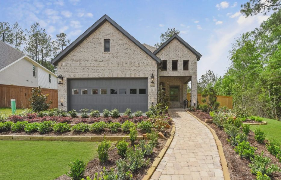Representative exterior photo of a completed home built from the Carlisle by Chesmar Homes in Legacy at Lake Dunlap, New Braunfels, TX (Image 1). Representative exterior photo of a completed home built from the Carlisle by Chesmar Homes in Legacy at Lake Dunlap, New Braunfels, TX (Image 1).