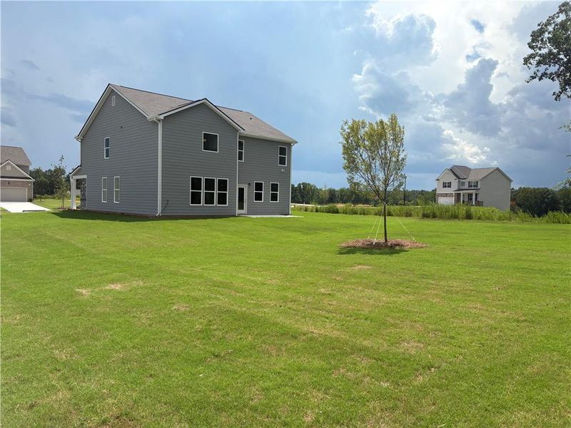 Exterior details and patio area of a home in Highland Park, Stonecrest (Image 3).