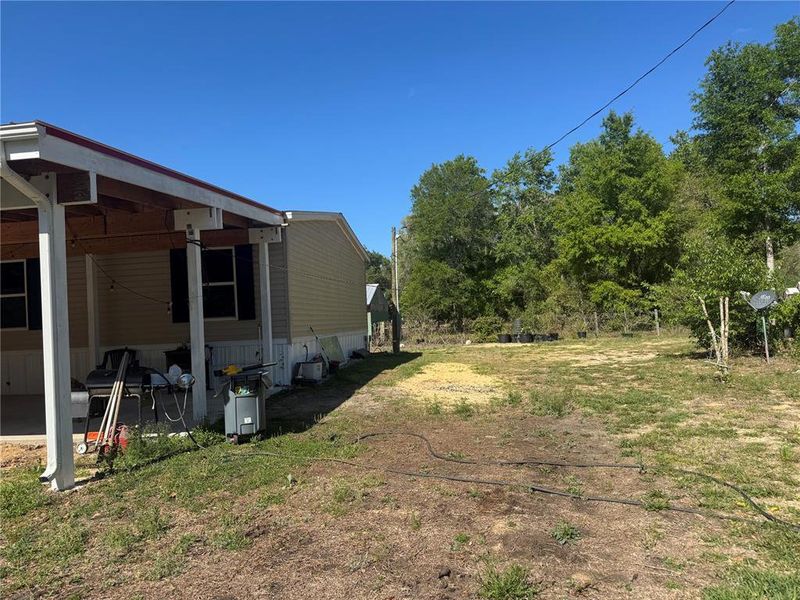 Exterior details and patio area of a home in , Williston (Image 1). Exterior details and patio area of a home in , Williston (Image 1).