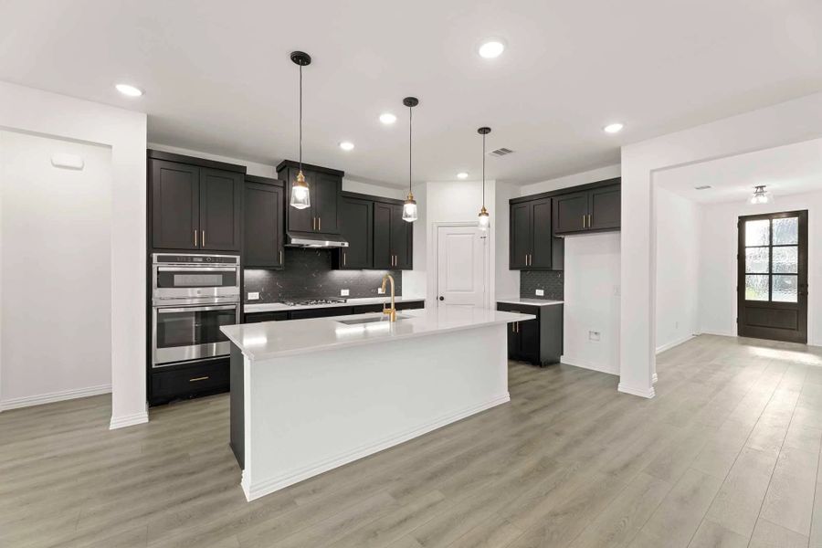 Kitchen featuring the Noir Collection Kitchen featuring the Noir Collection