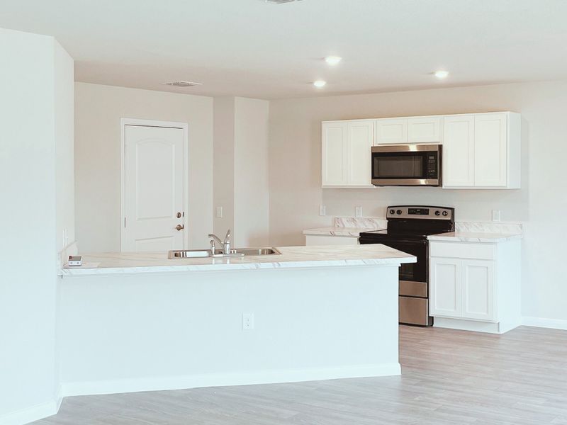 Representative furnished interior of a home built from the Sequoia by National HomeCorp in Summit Place, Eden (Image 8).