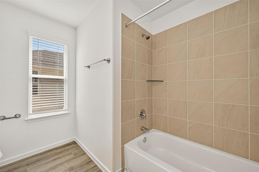 Furnished interior view inside a new home in Mill Creek Trails, Magnolia (Image 21).