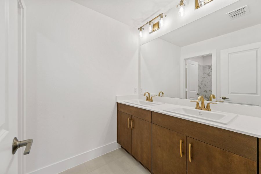 Furnished interior view inside a new home in Union Park, Little Elm (Image 8).