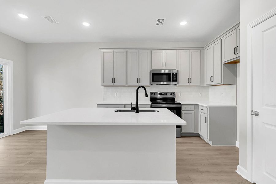 Furnished interior view inside a new home in , Summerville (Image 9).