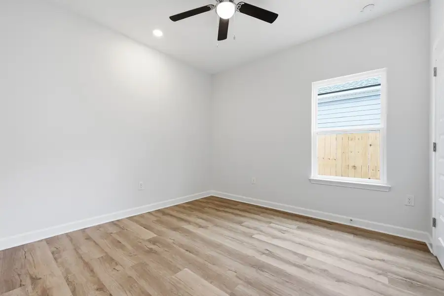 Spacious, unfurnished interior of a new home in Live Oak Cottages, Freeport (Image 18). Spacious, unfurnished interior of a new home in Live Oak Cottages, Freeport (Image 18).
