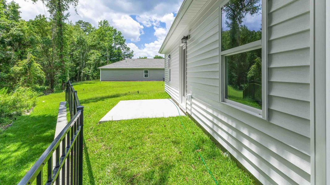 Front exterior of a new home in Eagle Creek, Bolivia, NC, highlighting curb appeal (Image 2).