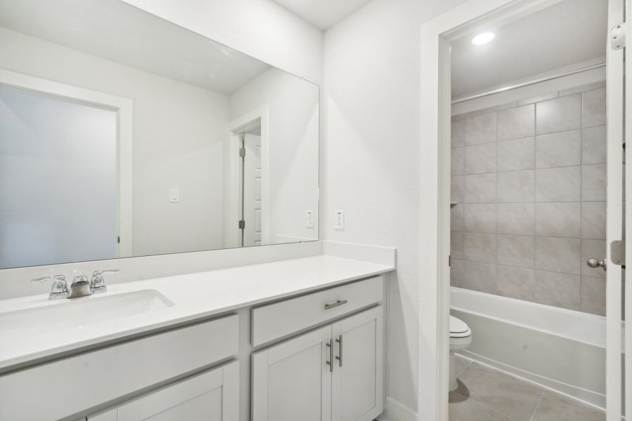 Guest bathroom in the Medina floorplan at a Meritage Homes community.