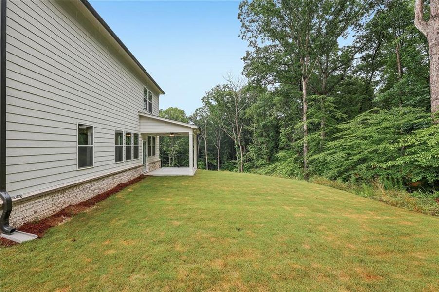 Exterior details and patio area of a home in Bailey Fence, Dacula (Image 3).