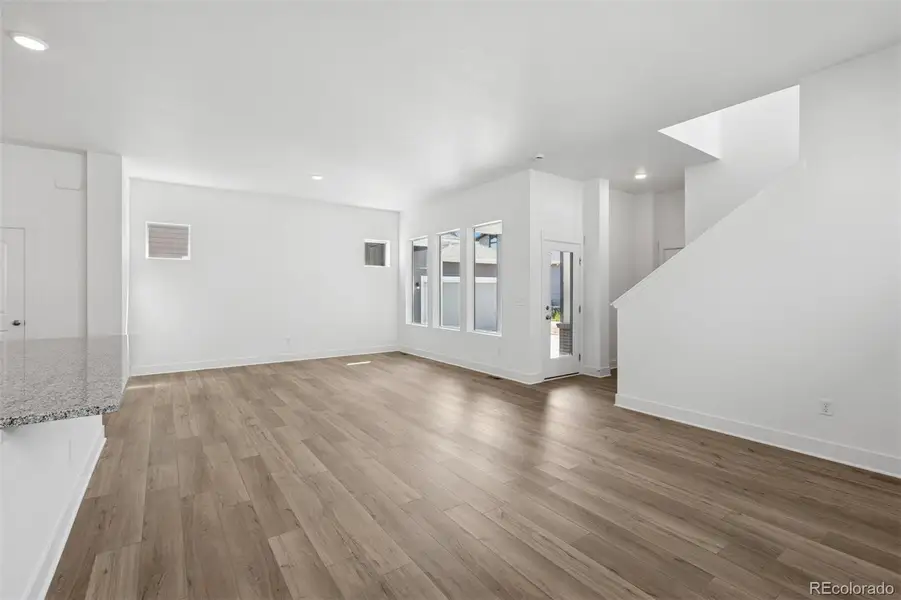 Spacious, unfurnished interior of a new home in Painted Prairie Cottage, Aurora (Image 38).