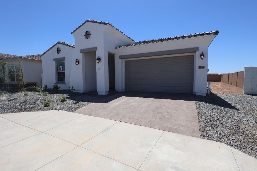 Front exterior of a new home in Alston at Soleo, San Tan Valley, AZ, highlighting curb appeal (Image 2). Front exterior of a new home in Alston at Soleo, San Tan Valley, AZ, highlighting curb appeal (Image 2).