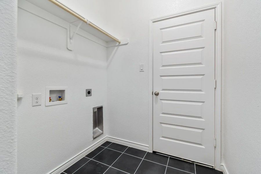 Laundry Room | Concept 1849 at Hunters Ridge in Crowley, TX by Landsea Homes