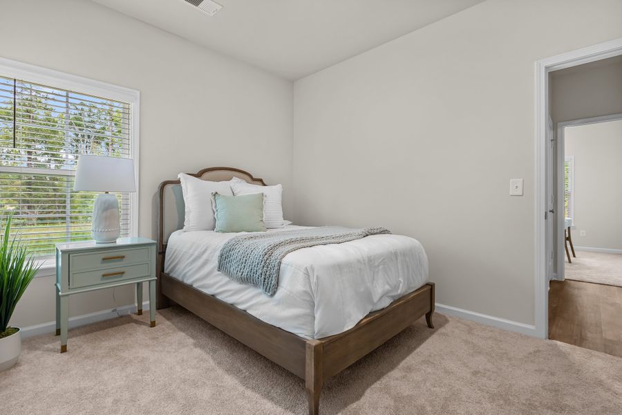 Representative furnished interior of a home built from the Hawthorne S by McGuinn Homes in Pine Street, Yemassee (Image 23).