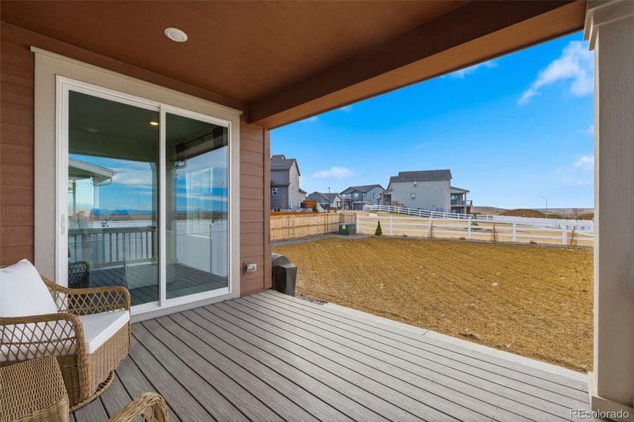 Exterior details and patio area of a home in Harvest Ridge, Aurora (Image 28).