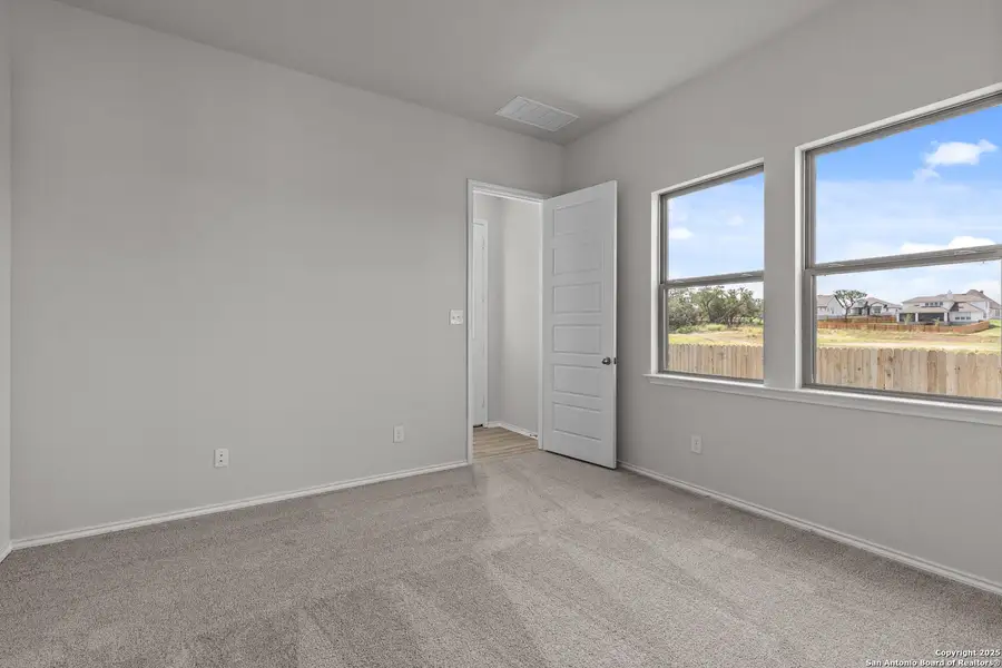 Spacious, unfurnished interior of a new home in Megan's Landing, Castroville (Image 24).