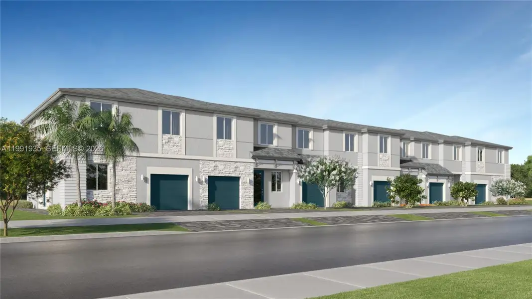 Front exterior of a new home in , Homestead, FL, highlighting curb appeal (Image 1). Front exterior of a new home in , Homestead, FL, highlighting curb appeal (Image 1).