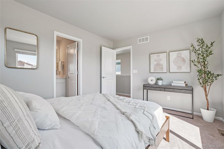 Furnished interior view inside a new home in Woodrose at Painted Prairie, Aurora (Image 17).