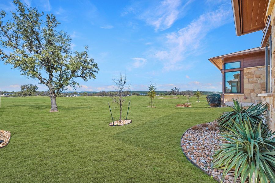 Exterior details and patio area of a home in Lakecliff on Lake Travis, Spicewood (Image 3).