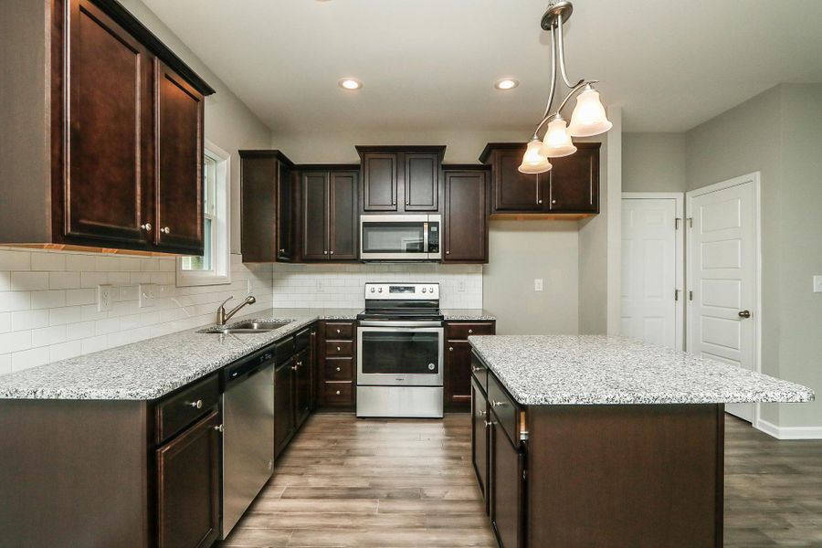 Representative furnished interior of a home built from the Palmer Plus by RiverWILD Homes in Riverwood Ranch, Clayton (Image 7).