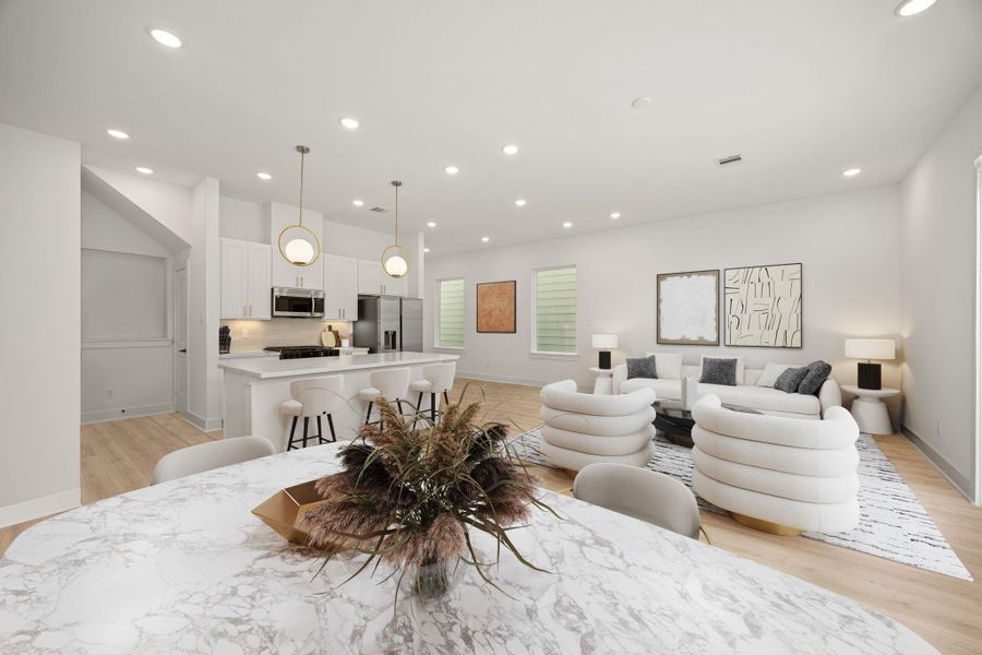 Make memories gathered around the table with your family and friends! This dining room features high ceilings, vinyl plank flooring and great access to both living and kitchen spaces. Make memories gathered around the table with your family and friends! This dining room features high ceilings, vinyl plank flooring and great access to both living and kitchen spaces.