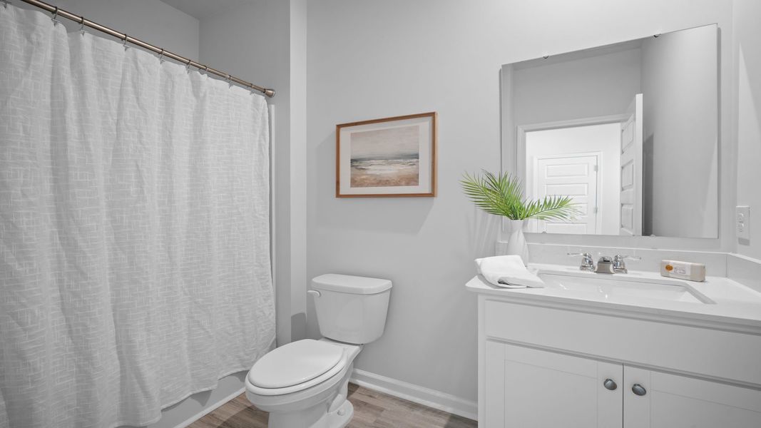 Furnished interior view inside a new home in The Lakes at North Glynn, Brunswick (Image 15).