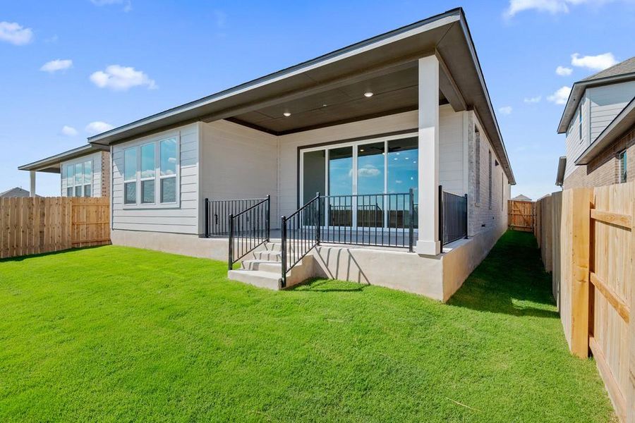 Exterior details and patio area of a home in Lariat, Liberty Hill (Image 3).