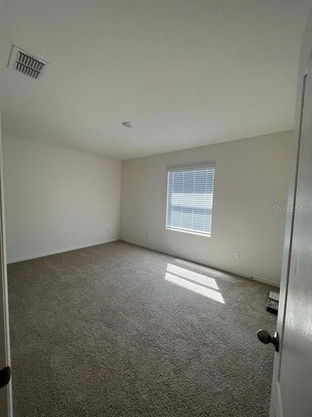 Spacious, unfurnished interior of a new home in Atria at Ridgewood Lakes, Davenport (Image 8).