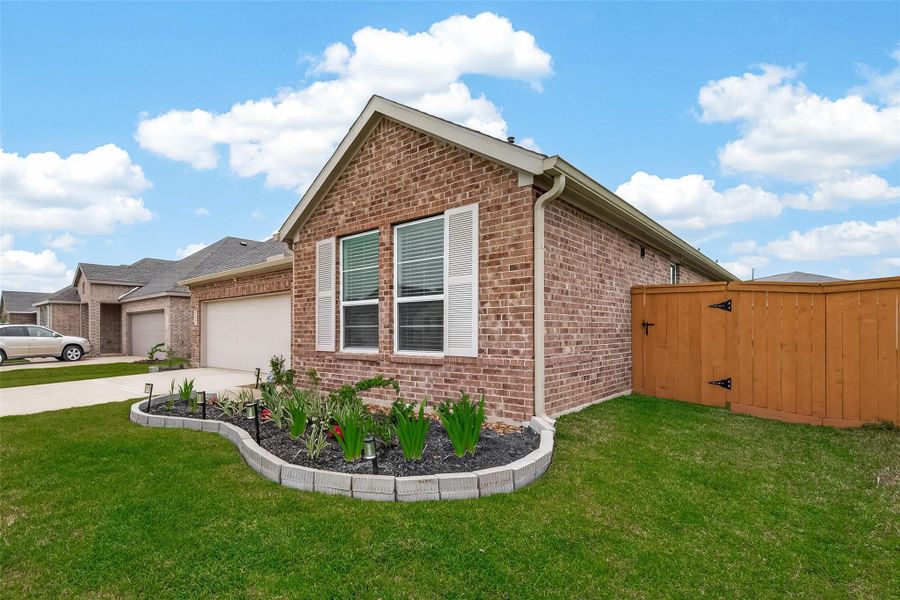 Charming brick exterior with manicured landscaping and inviting curb appeal that makes a strong first impression.