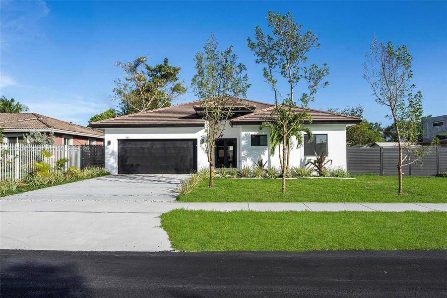 Front exterior of a new home in , Cutler Bay, FL, highlighting curb appeal (Image 20).