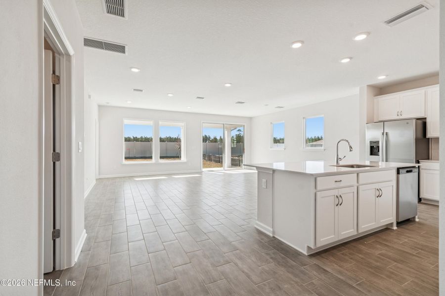 Furnished interior view inside a new home in Tributary 50', Yulee (Image 16).