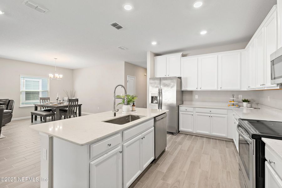 Furnished interior view inside a new home in Gentle Woods North, Jacksonville (Image 6).