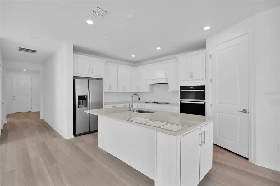 Furnished interior view inside a new home in Seminole Palms, Palm Coast (Image 11).