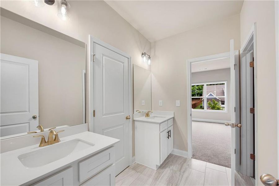 Furnished interior view inside a new home in Hidden Fields, Hoschton (Image 14).