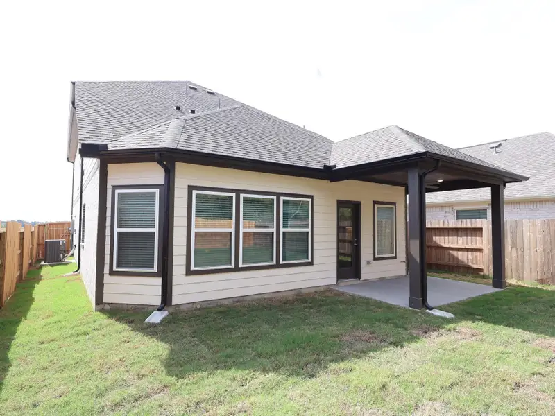 Exterior details and patio area of a home in Sorella, Tomball (Image 11). Exterior details and patio area of a home in Sorella, Tomball (Image 11).