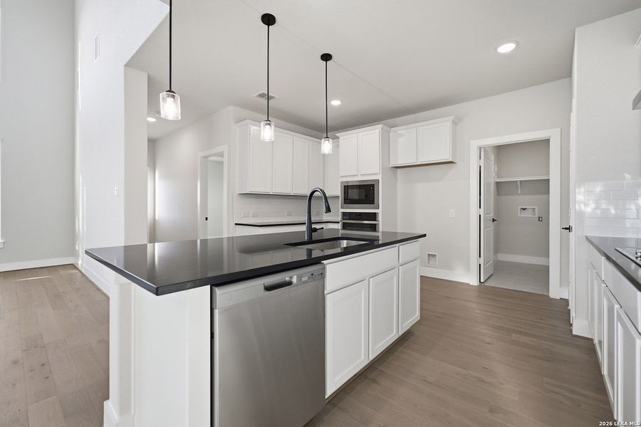Furnished interior view inside a new home in The Woodlands at Medina Hills, Mico (Image 10).
