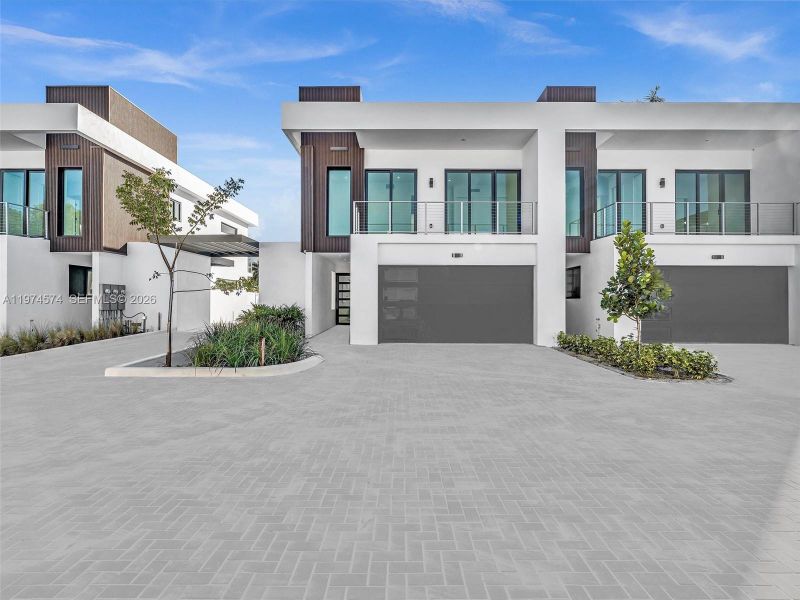 Front exterior of a new home in , Dania Beach, FL, highlighting curb appeal (Image 33).