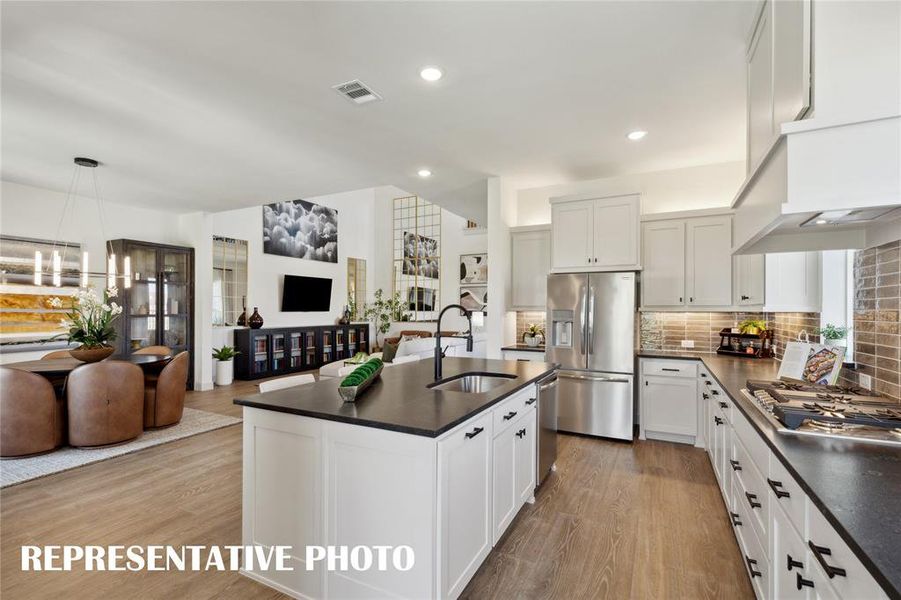 Open concept living at it's finest when you call Hazelwood your home!  REPRESENTATIVE PHOTO OF MODEL HOME