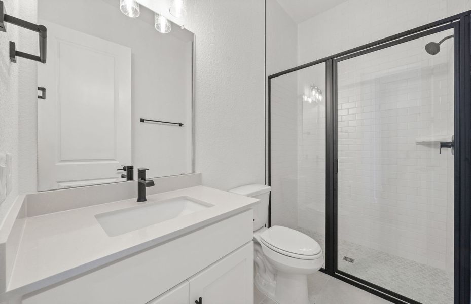 Furnished interior view inside a new home in 6 Creeks, Kyle (Image 13).