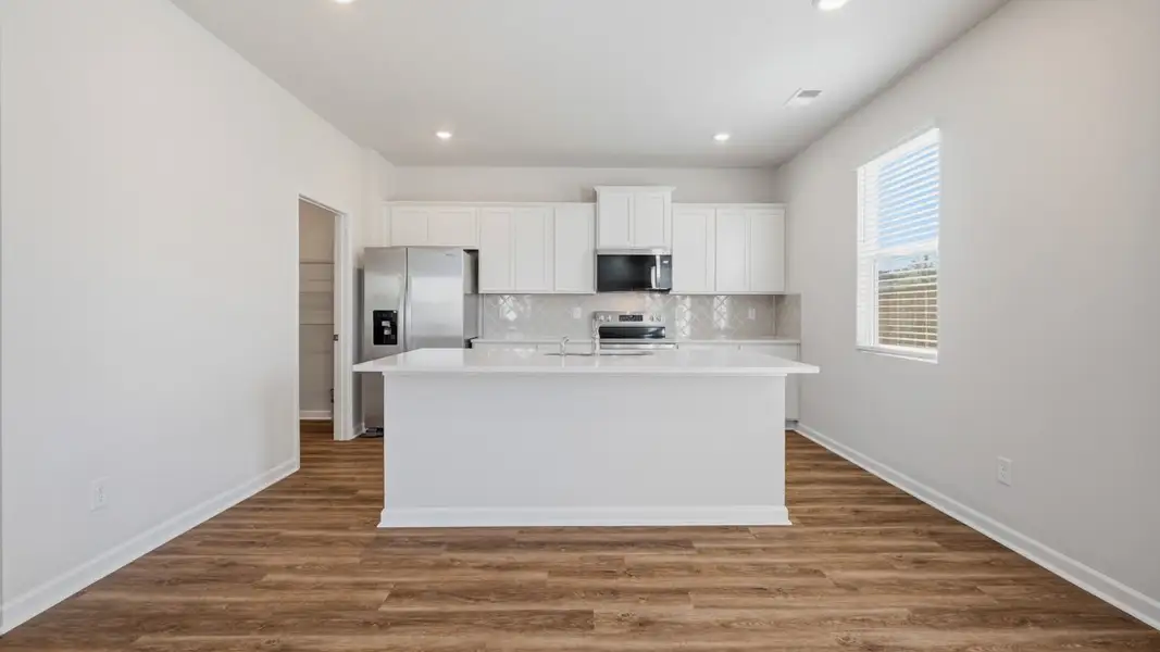 Furnished interior view inside a new home in The Reserve at Calcutta, Stockbridge (Image 4).