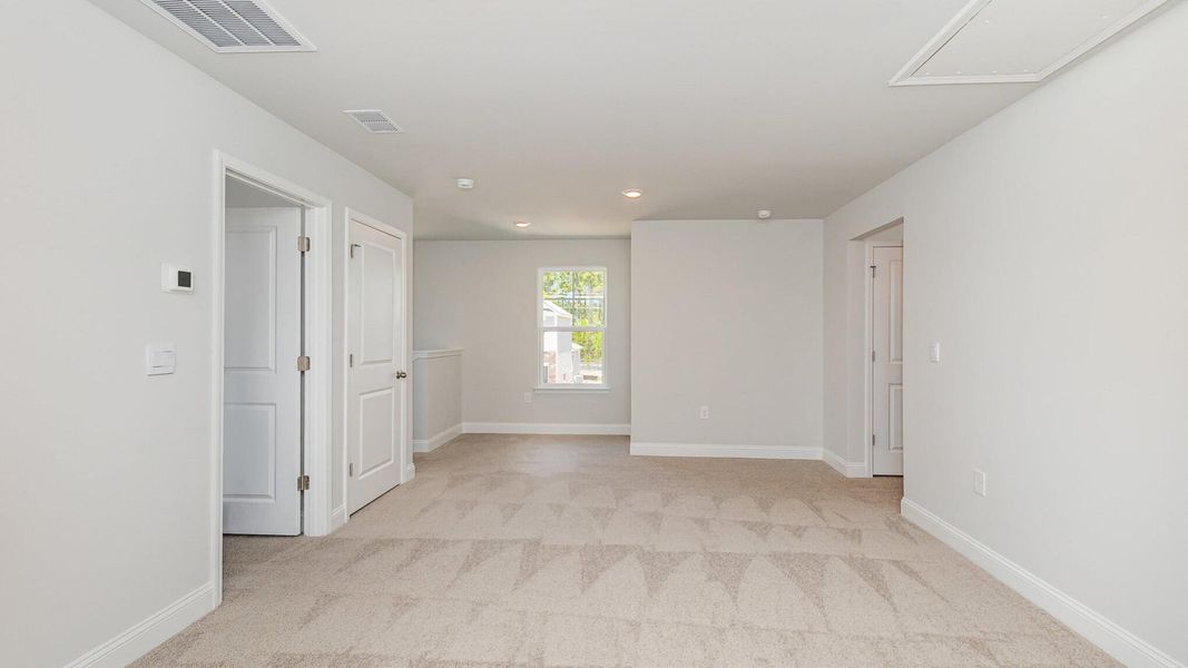 Spacious, unfurnished interior of a new home in The Ranch, Holly Hill (Image 19).
