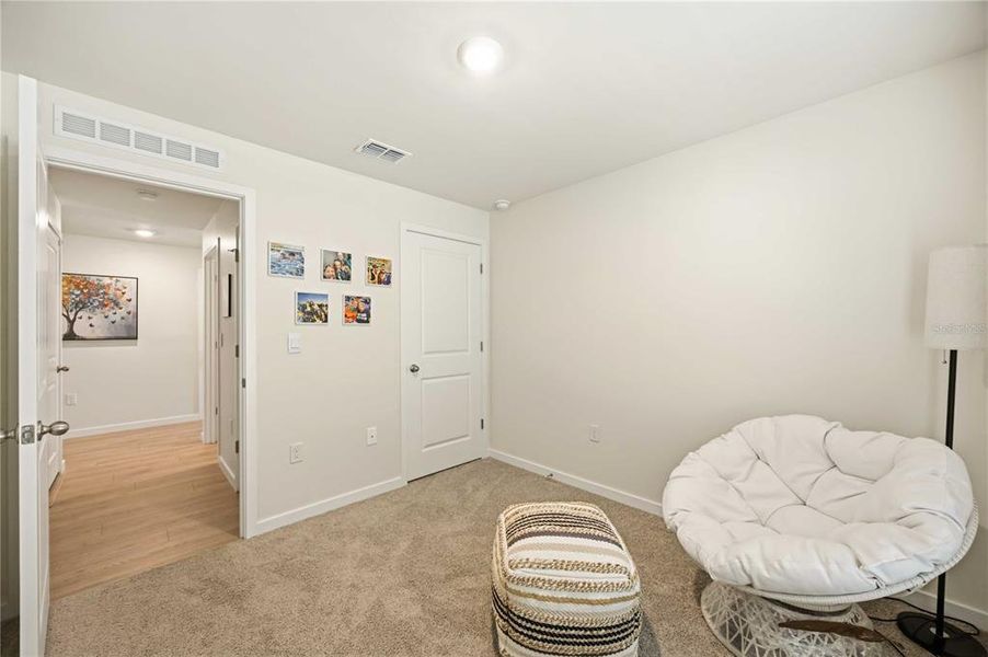 Furnished interior view inside a new home in Central Parc, North Port (Image 17).